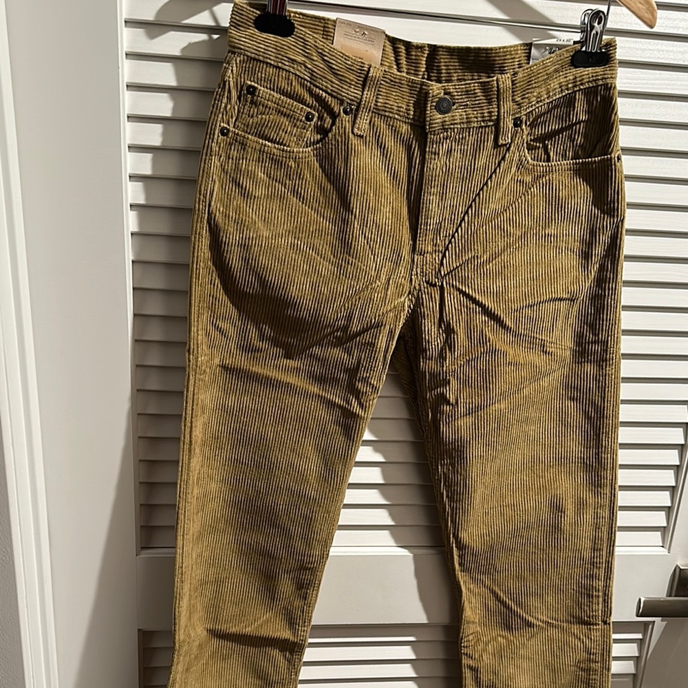 NWT Levi’s Original Mustard Color Five Pockets with Boot Legs pants.
